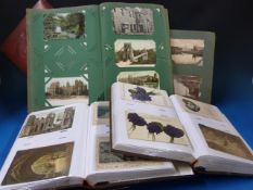 A collection of postcards and postcard a