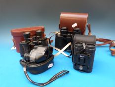 Four pairs of binoculars including a Car