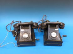 A pair of vintage wind-up telephones