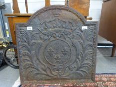 A cast iron fire back, width 59cm