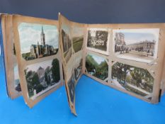 An Edwardian postcard album, cards inclu