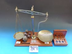 A set of brass and mahogany balance scal