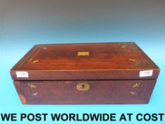 A 19thC rosewood writing slope with bras