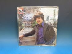 A collection of 80-plus LPs, the large m