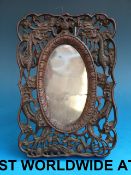 A carved Chinese hardwood photograph fra