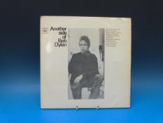 Ten folk LPs.  Bob Dylon 