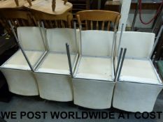 A set of eight modern white dining chair