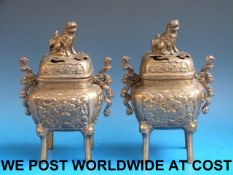 A pair of Japanese bronze koros with rel