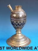 WITHDRAWN An Islamic coconut shell hooka