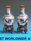 A pair of Chinese cloisonne vases with b