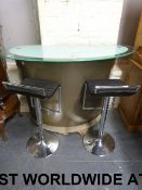 A modern crescent shaped metal and glass