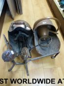 A box of fireside tools, two irons with