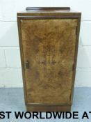 An Art Deco burr walnut pot cupboard (wi