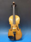 A good quality early 20thC violin in woo