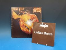 Fifty-eight LPs and 12 7in singles nearl