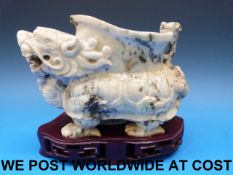 A Chinese jadeite figural vase in the fo