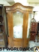 A glazed burr walnut display cabinet hav