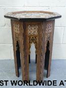 An Islamic octagonal table inlaid with m