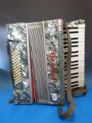 A 48 bass grey pearloid Geraldo piano ac