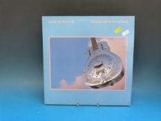 Seven DIRE STRAITS records.  three LPs: