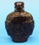 A 19thC Chinese cherry amber type carved
