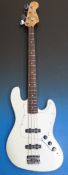 A Fender Squire jazz electric bass guita