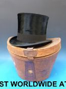 A silk top hat by Kirsop and Sons, Glasg
