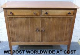 A retro teak sideboard fitted two drawer