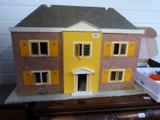 Large dolls house together with two boxe