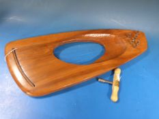 A fruitwood hand-carved lyre from the Jo