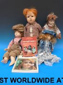 Four various collectors dolls all in ful