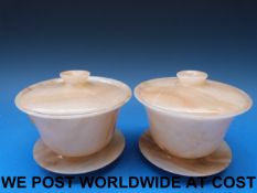 A pair of Chinese carved onyx lidded bow