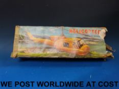 A battery operated model helicopter in o