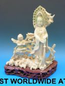 A Chinese jadeite carving of Guanyin and