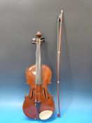 An anonymous vintage cased violin togeth