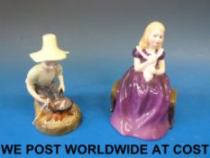 A Royal Doulton figure River Boy (HN2128