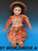 An SFBJ bisque headed doll with open mou