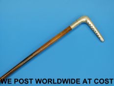 A rhinoceros horn riding crop with hallm