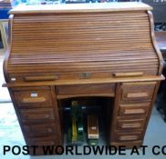 A modestly proportioned oak twin pedesta