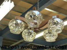 A pair of light oak and glass five branc