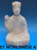 A Chinese Han dynasty model of a seated