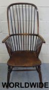 A Windsor stick back armchair with elm s