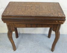 A 19thC Syrian games table inlaid with v