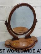 A 19th century oval dressing table mirro