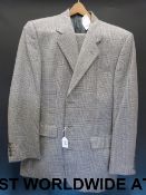 A grey checked Burberry suit (size small