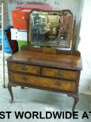 A Waring and Gillow walnut dressing tabl