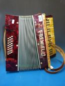 A 24 bass red pearloid Fremielio piano a