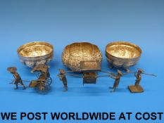 Three Indian white metal embossed bowls