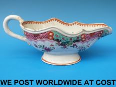 An 18thC Chinese famille rose sauce boat