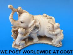 A 19thC Chinese ivory model of boys wash